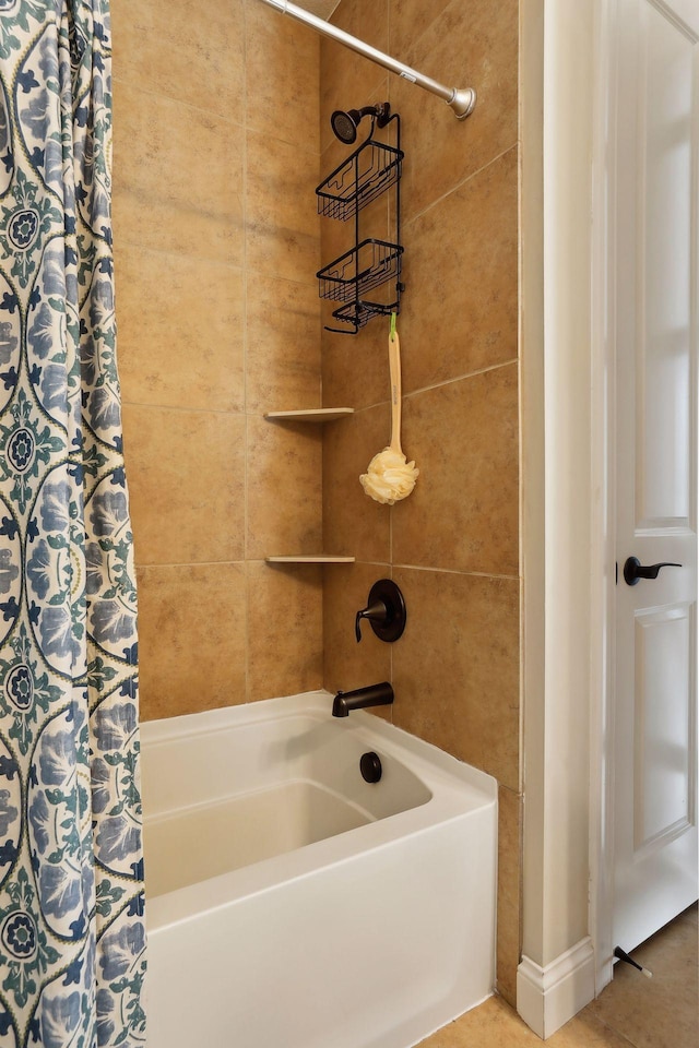 bathroom with shower / bath combo