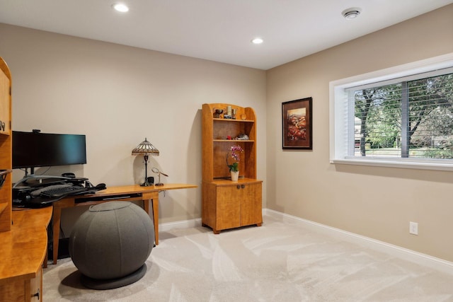 carpeted office with recessed lighting and baseboards