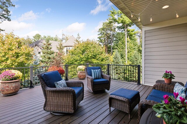 deck featuring outdoor lounge area