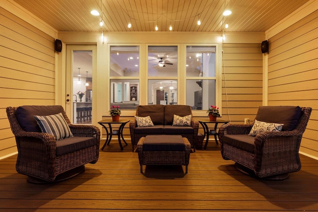 wooden terrace featuring an outdoor hangout area