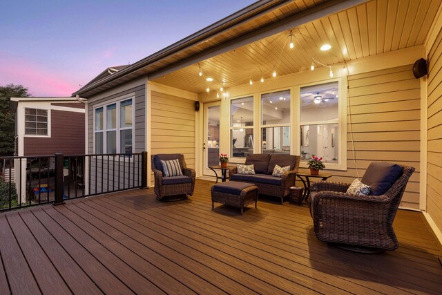 wooden deck featuring an outdoor hangout area