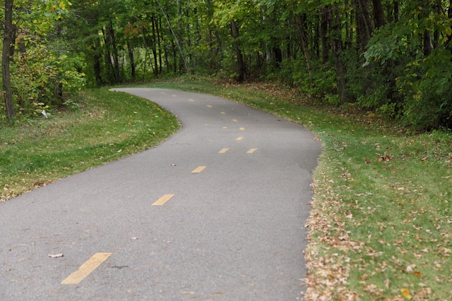 view of road featuring a view of trees