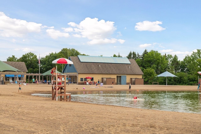 exterior space with a water view