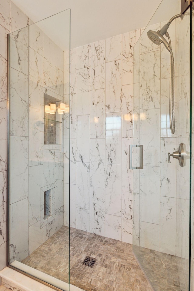 bathroom featuring a stall shower