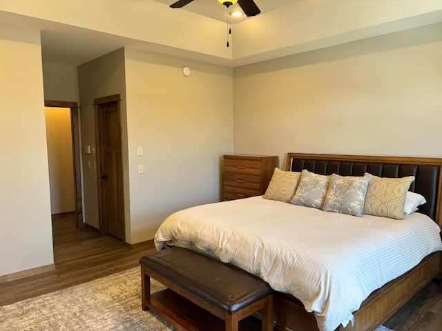 bedroom featuring ceiling fan and wood finished floors