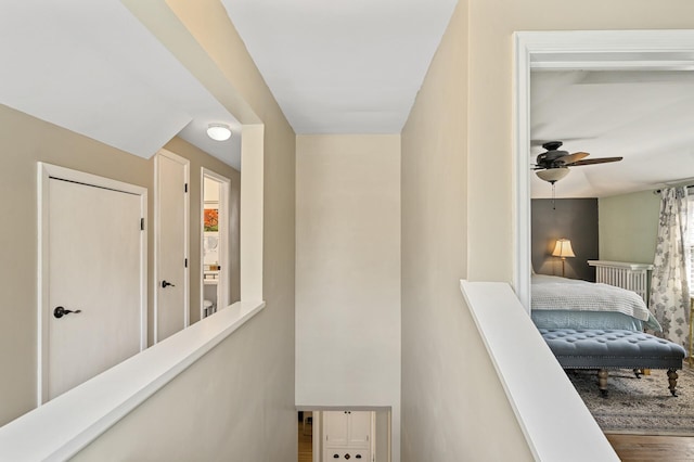 hall featuring wood finished floors