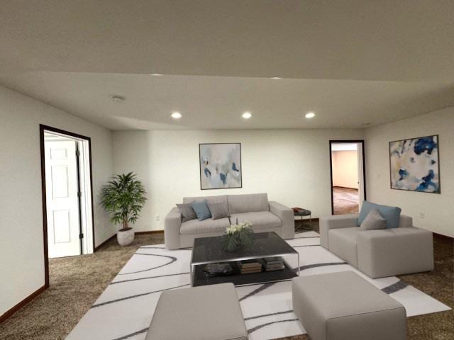 carpeted living area featuring recessed lighting and baseboards