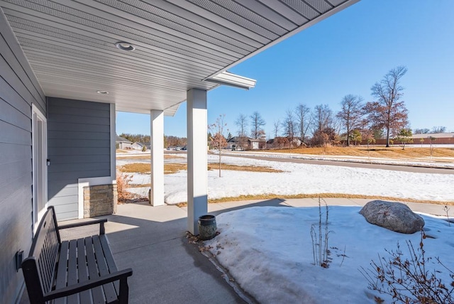 view of snow covered patio