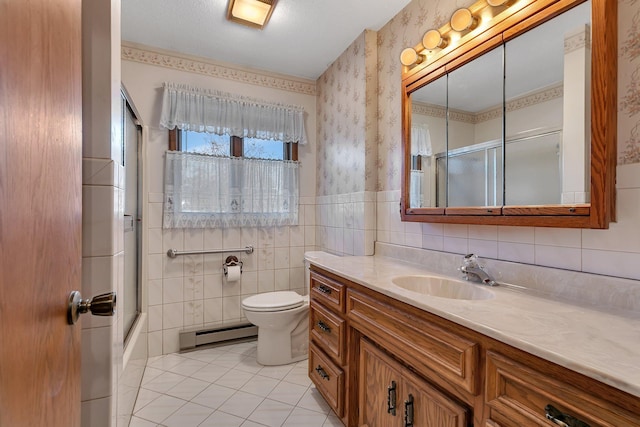 bathroom featuring tile walls, a baseboard radiator, toilet, vanity, and wallpapered walls