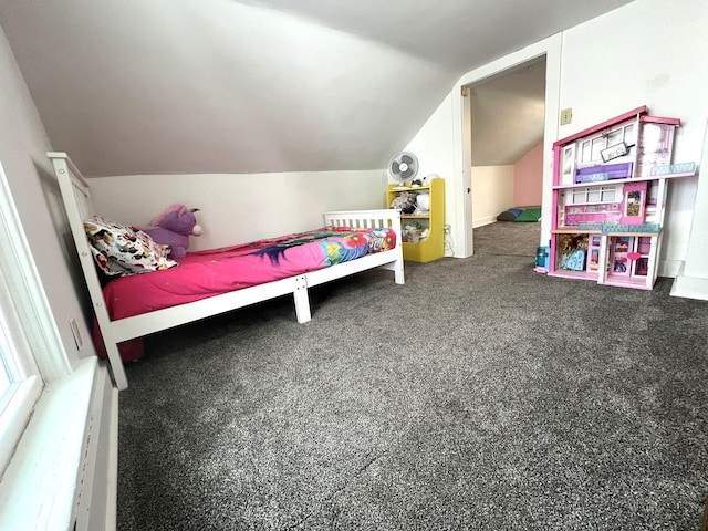 carpeted bedroom featuring lofted ceiling