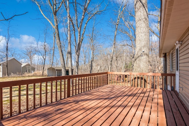 deck featuring an outbuilding