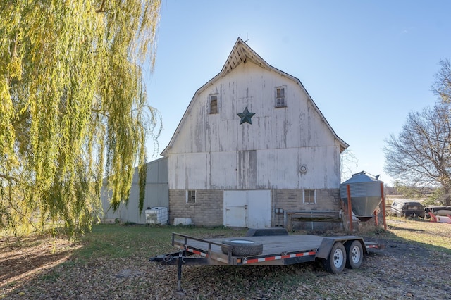 exterior space with a barn and an outdoor structure