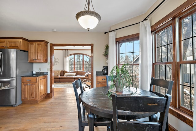 dining room with light wood-type flooring