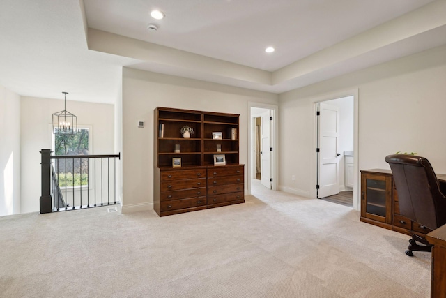 carpeted office featuring recessed lighting, a raised ceiling, baseboards, and an inviting chandelier