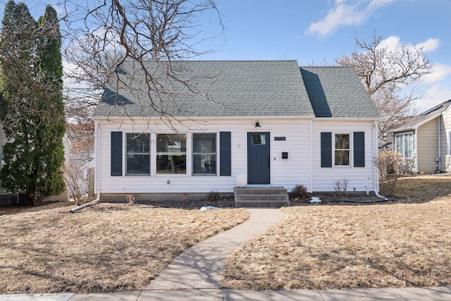 view of front of house with a shingled roof