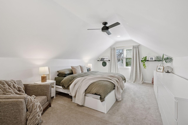 bedroom with light carpet, lofted ceiling, and ceiling fan