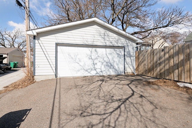 detached garage with fence