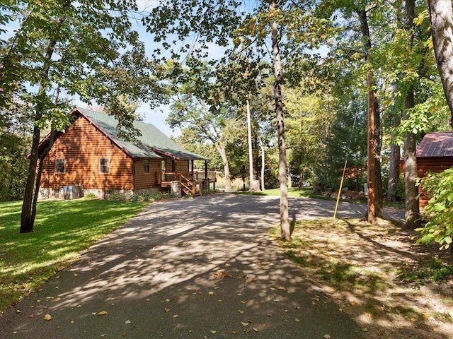 view of road with driveway