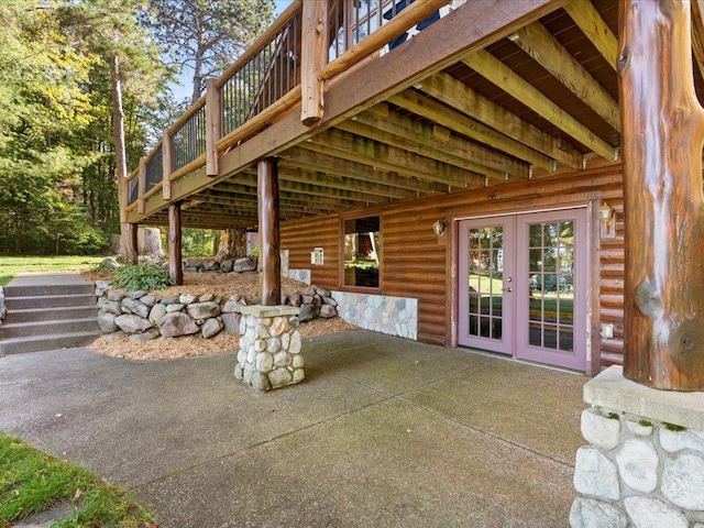 view of patio featuring french doors and a wooden deck