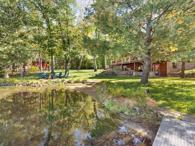 view of yard with a wooden deck