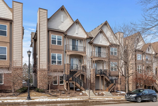 view of front of property with stairway