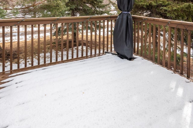 view of snow covered deck