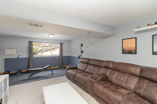 carpeted living area featuring visible vents, baseboards, and a textured ceiling