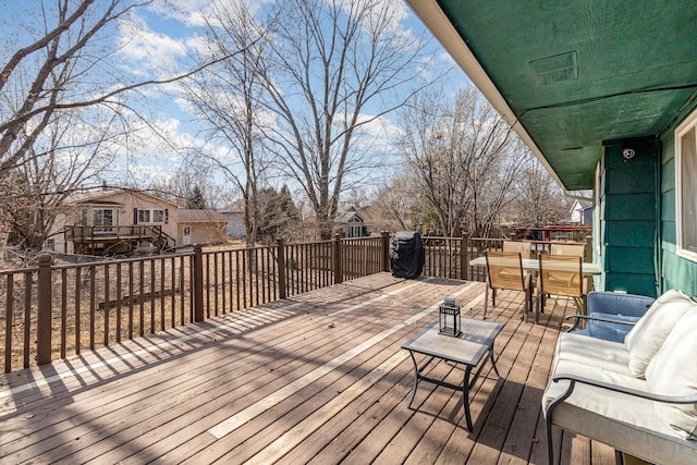 deck featuring outdoor dining space