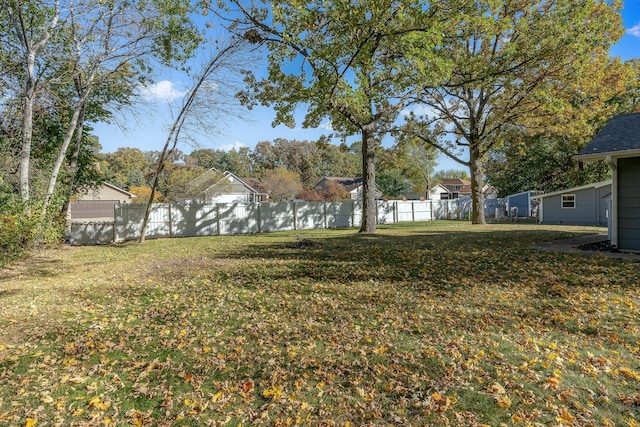 view of yard featuring fence