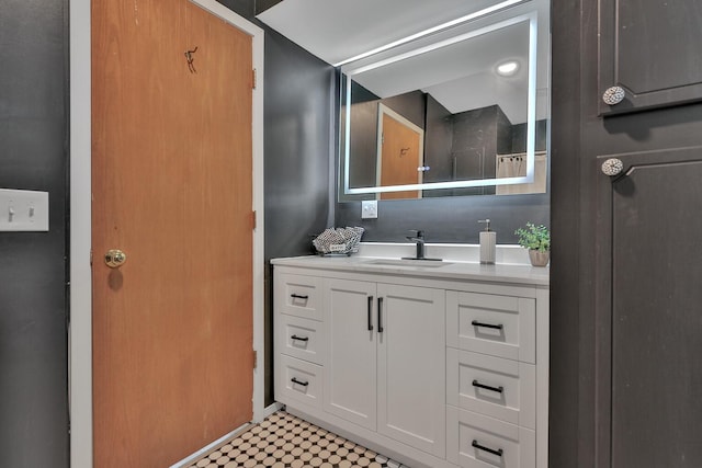 bathroom with vanity and tile patterned floors