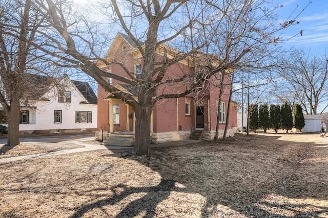 exterior space with brick siding