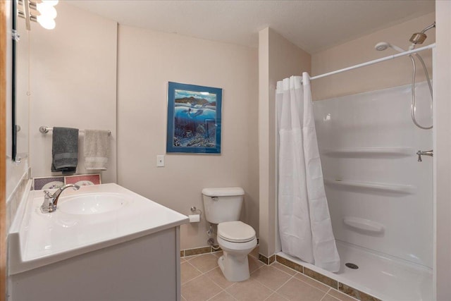 full bathroom featuring toilet, a shower with curtain, vanity, and tile patterned floors