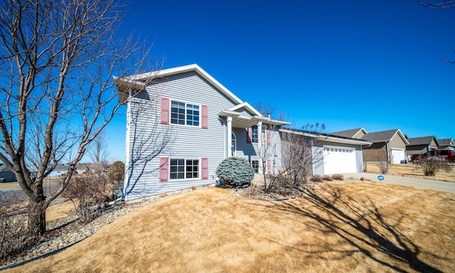 view of front of house with driveway and an attached garage