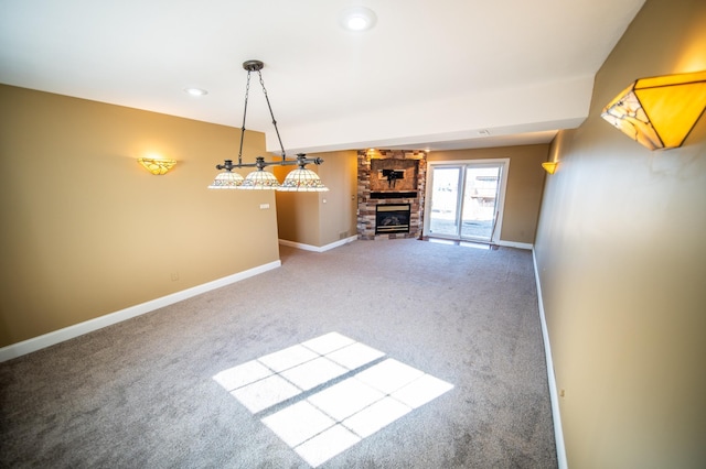 interior space featuring recessed lighting, a fireplace, carpet flooring, and baseboards