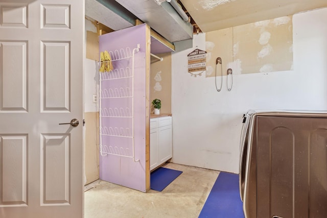 interior space featuring unfinished concrete floors