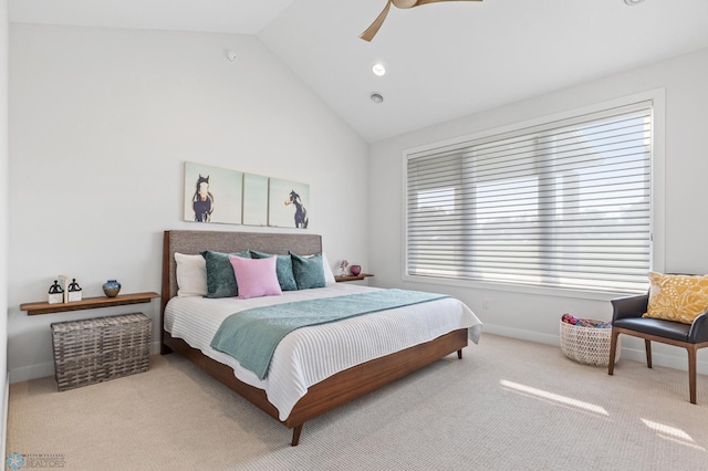 bedroom featuring lofted ceiling, ceiling fan, baseboards, and carpet flooring