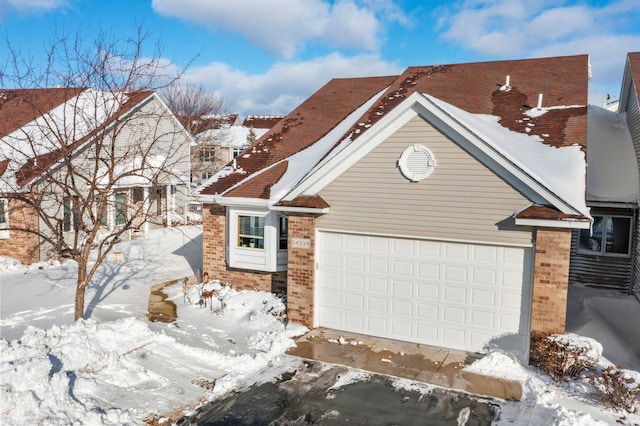 view of front of house with brick siding