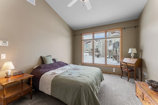 bedroom with baseboards, a ceiling fan, vaulted ceiling, and carpet flooring