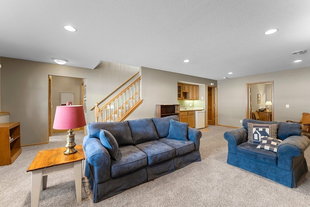 living room with light carpet, baseboards, stairway, and recessed lighting