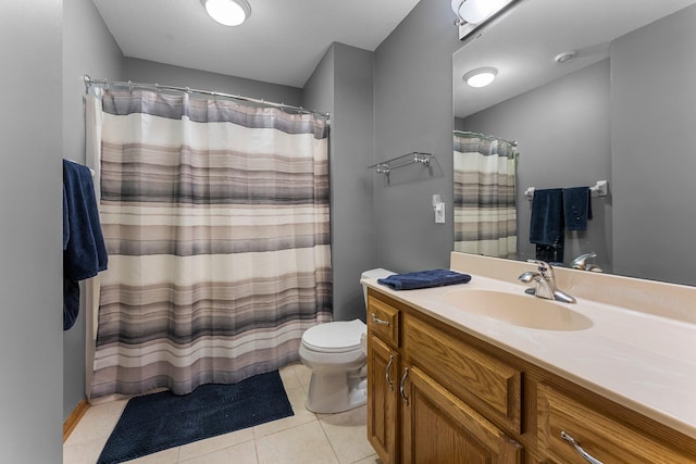 full bathroom featuring a shower with curtain, vanity, toilet, and tile patterned floors