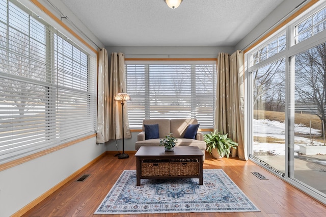 sunroom featuring visible vents