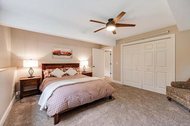 bedroom with carpet floors, a closet, a ceiling fan, and baseboards
