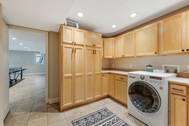 clothes washing area featuring washer / clothes dryer, cabinet space, recessed lighting, light tile patterned floors, and baseboards