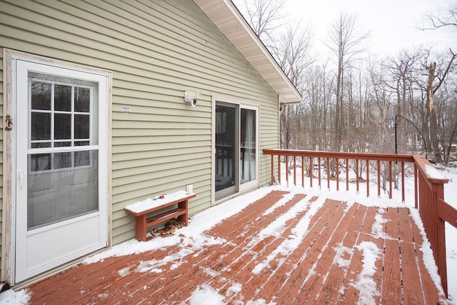 view of snow covered deck