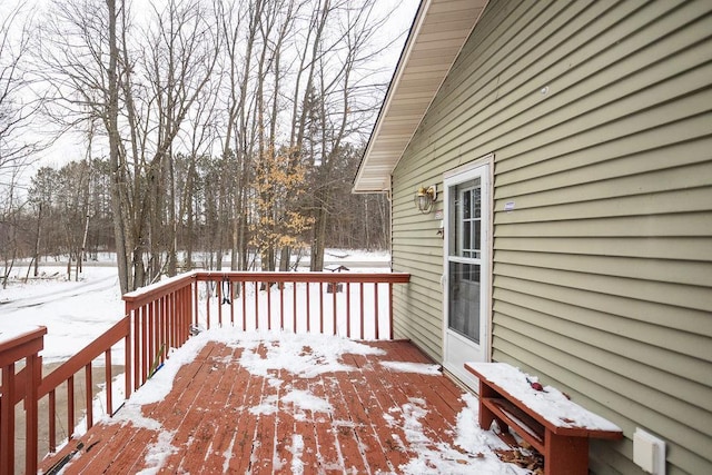 view of snow covered deck