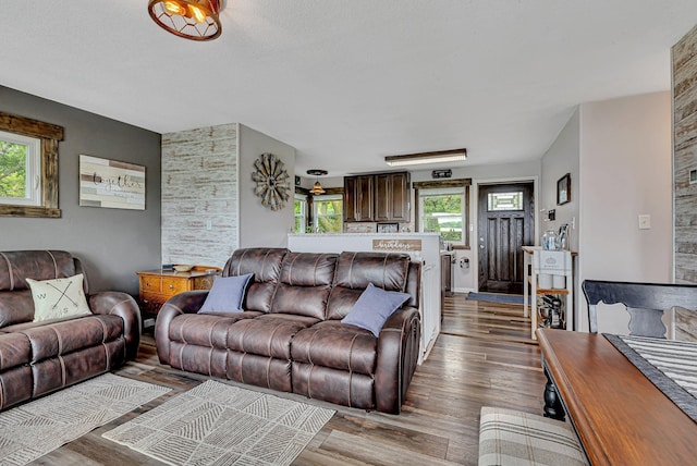 living area with wood finished floors