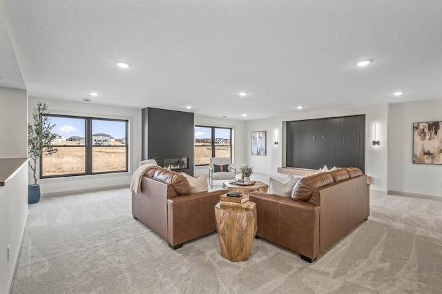 living room with light carpet, recessed lighting, and baseboards