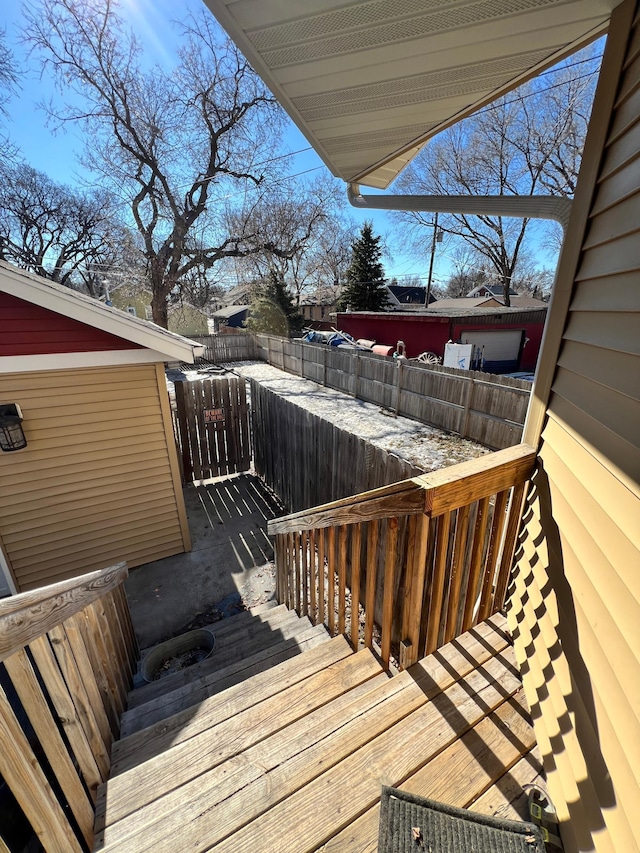 wooden deck featuring fence