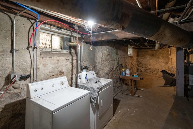 laundry room featuring laundry area and washer and clothes dryer