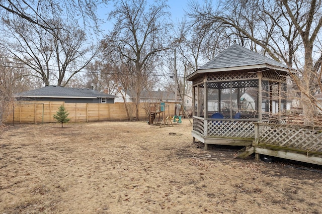 view of yard with a gazebo and a fenced backyard